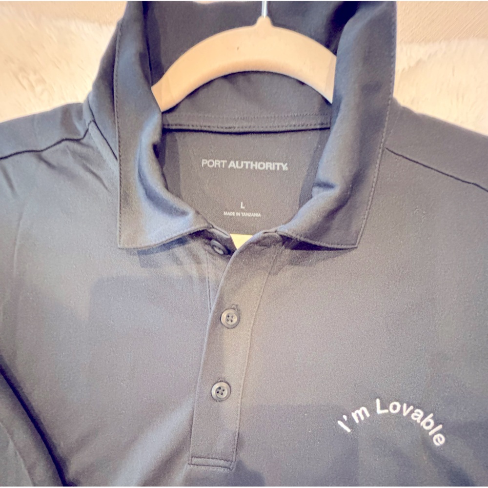 Men’s unique black polo. Lovable line very comfortable